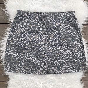 Rebel Rogue Animal Print Snap Front Skirt
